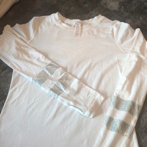 White long sleeve ivivva T-shirt.
